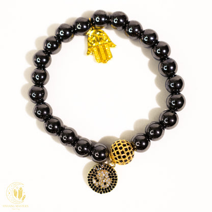 Linh Phù - Vòng Hematite Charm Thần Chú OM